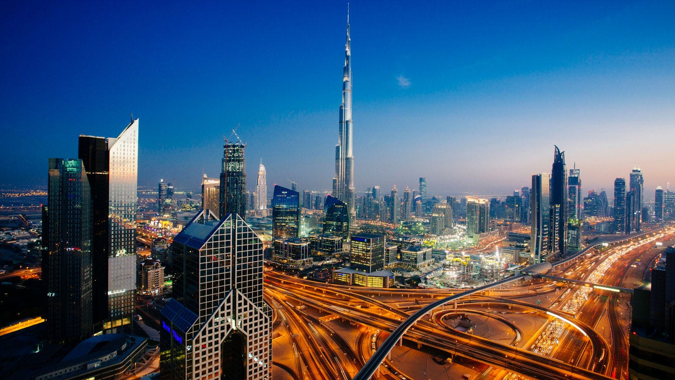 Dusk view of awesome Dubai's sky line, Aerial view of the city at blue hour.