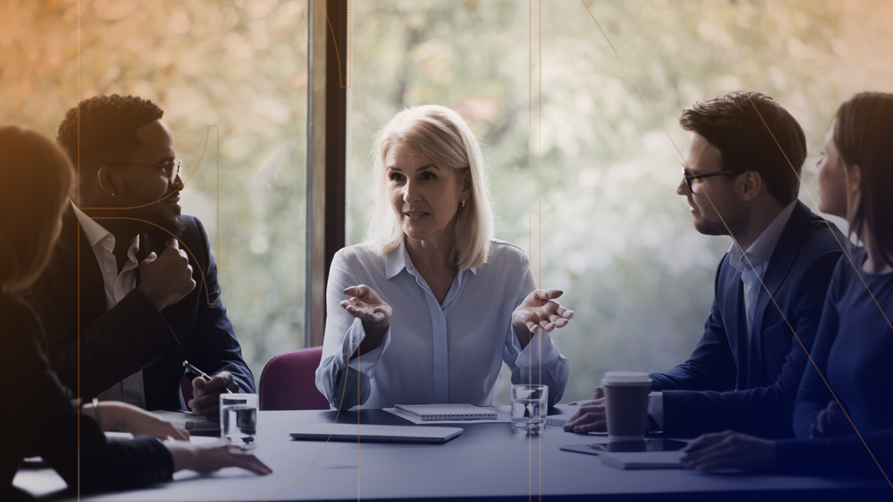 Executives meeting in an office discussing business