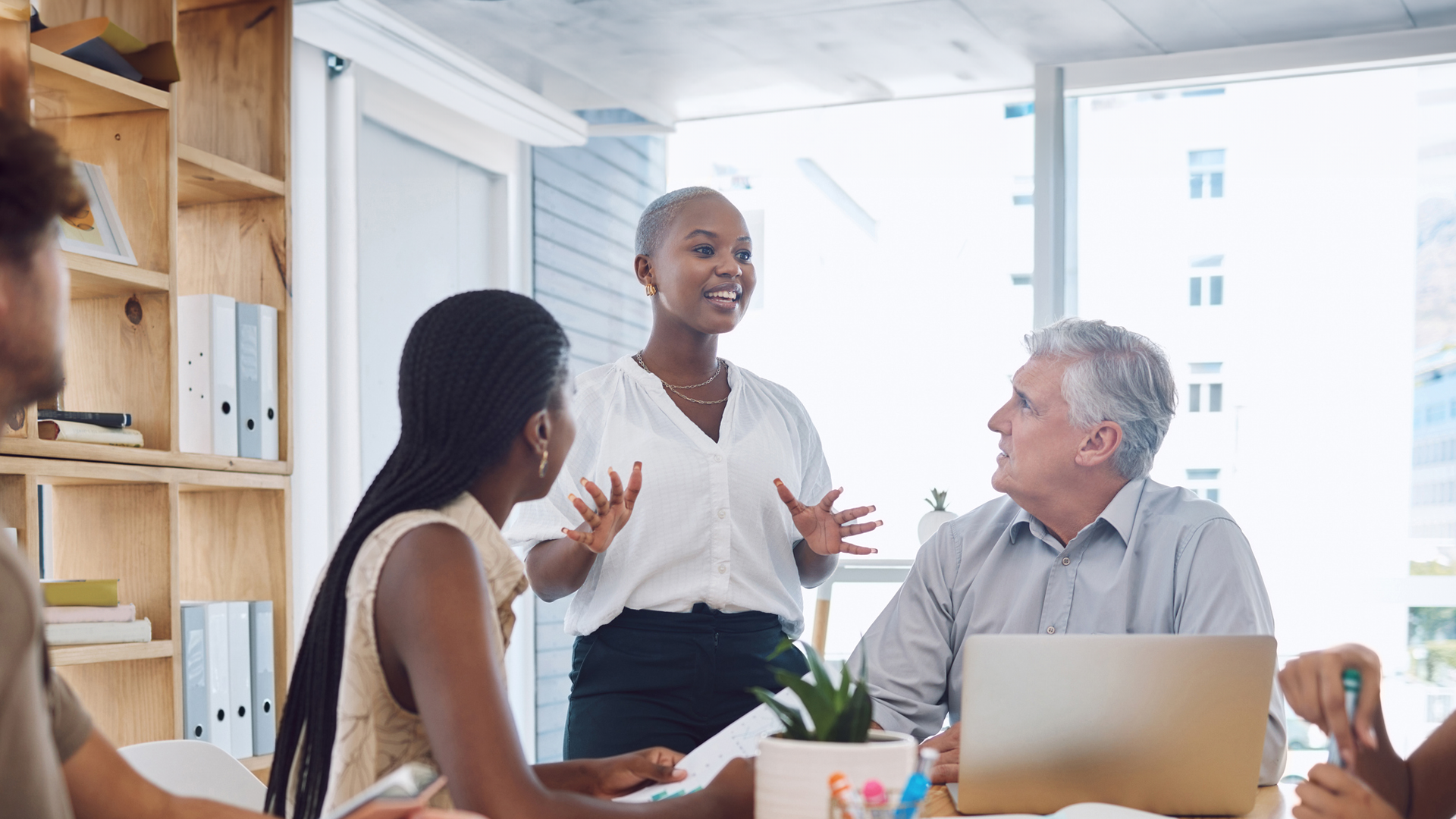 Employee speaks to her team