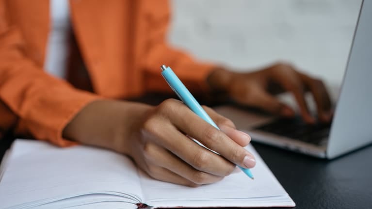 Lady taking notes