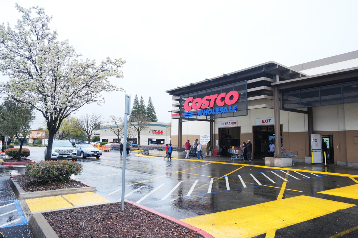 an exterior of a Costco retailer on a rainy afternoon
