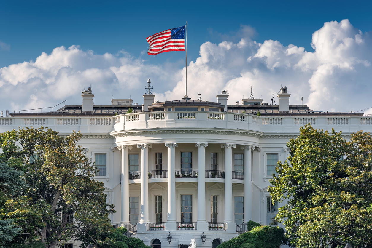 The White House with a U.S. flag flying on the roof