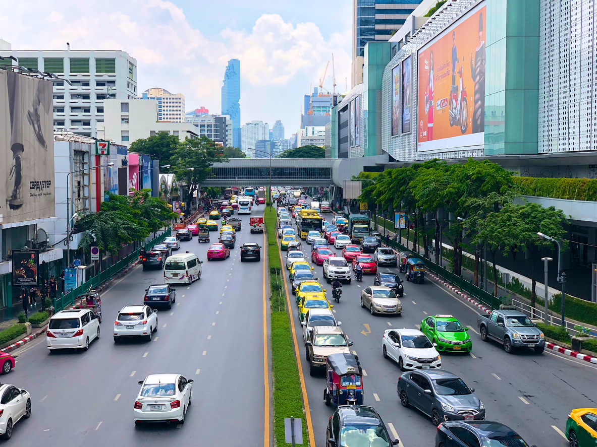 Traffic on Sukhumvit road, business area, Bangkok. View from BTS sky train, traffic before office time out.  Asian mega cities complicated traffic. Bangkok, Thailand