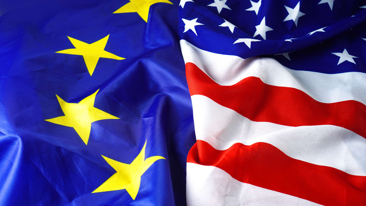 Two american and european flags on a white background.